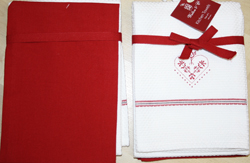 Pair of red/white teatowels